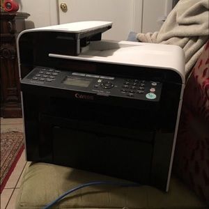 Copier, Fax, and Scanner.